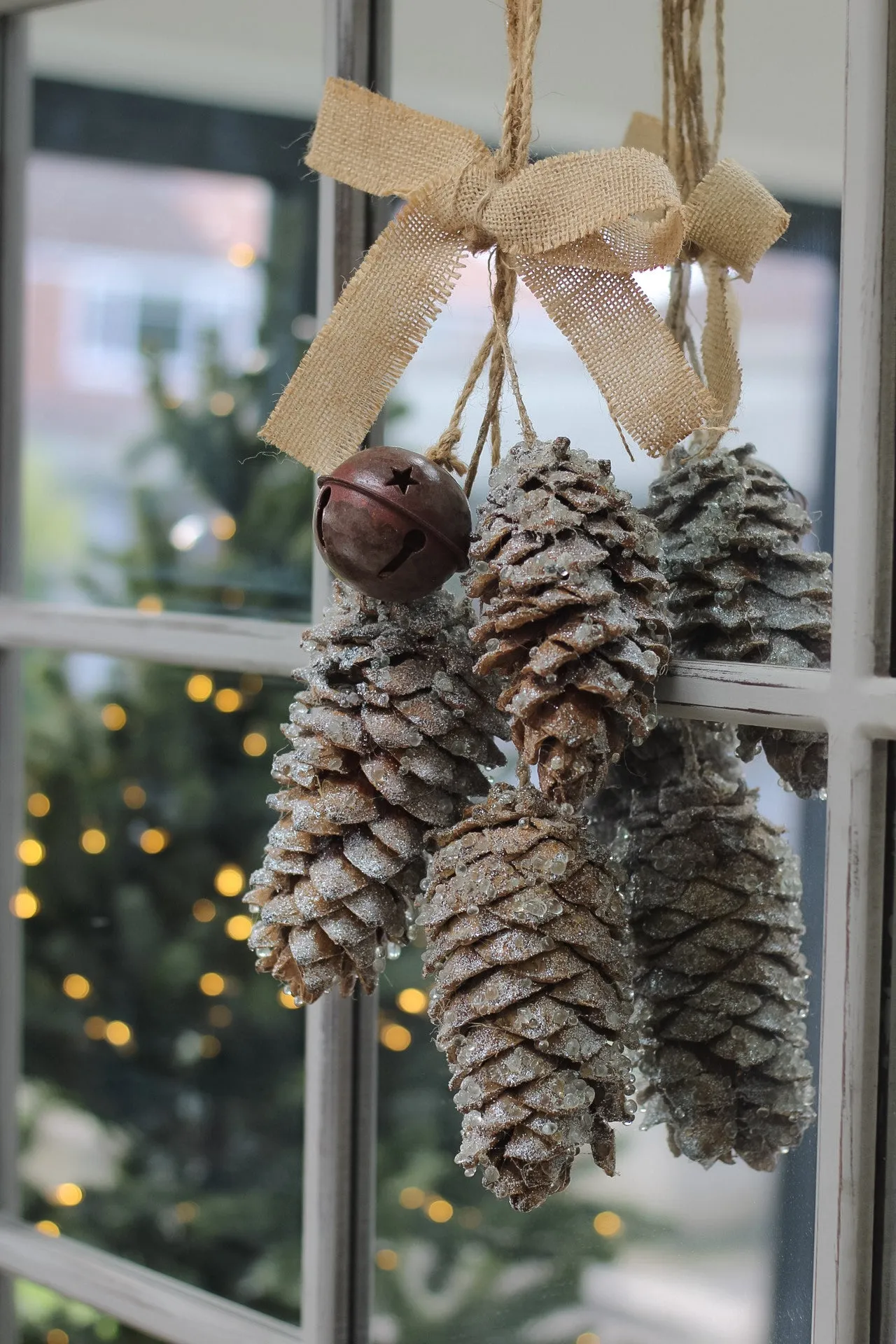 Hanging Pinecones and Rustic Bell with Hessian Bow